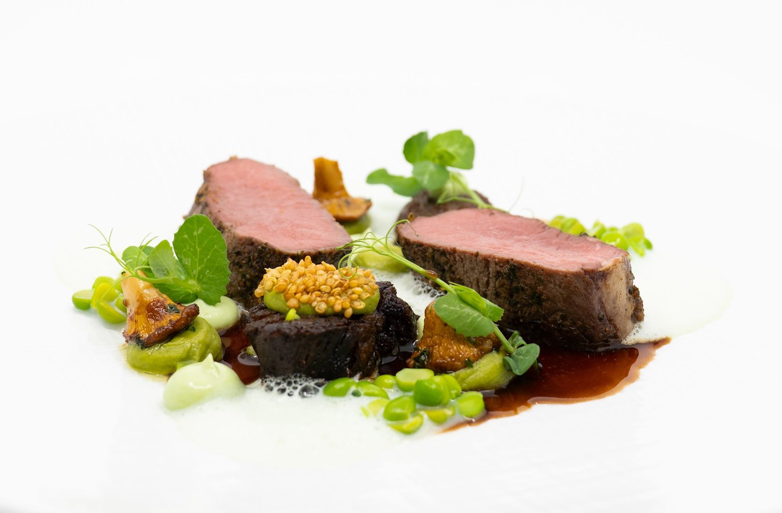 Hollands lam met groene asperges, doperwten en saus van lavas, Restaurant Het Koetshuis in Bennekom